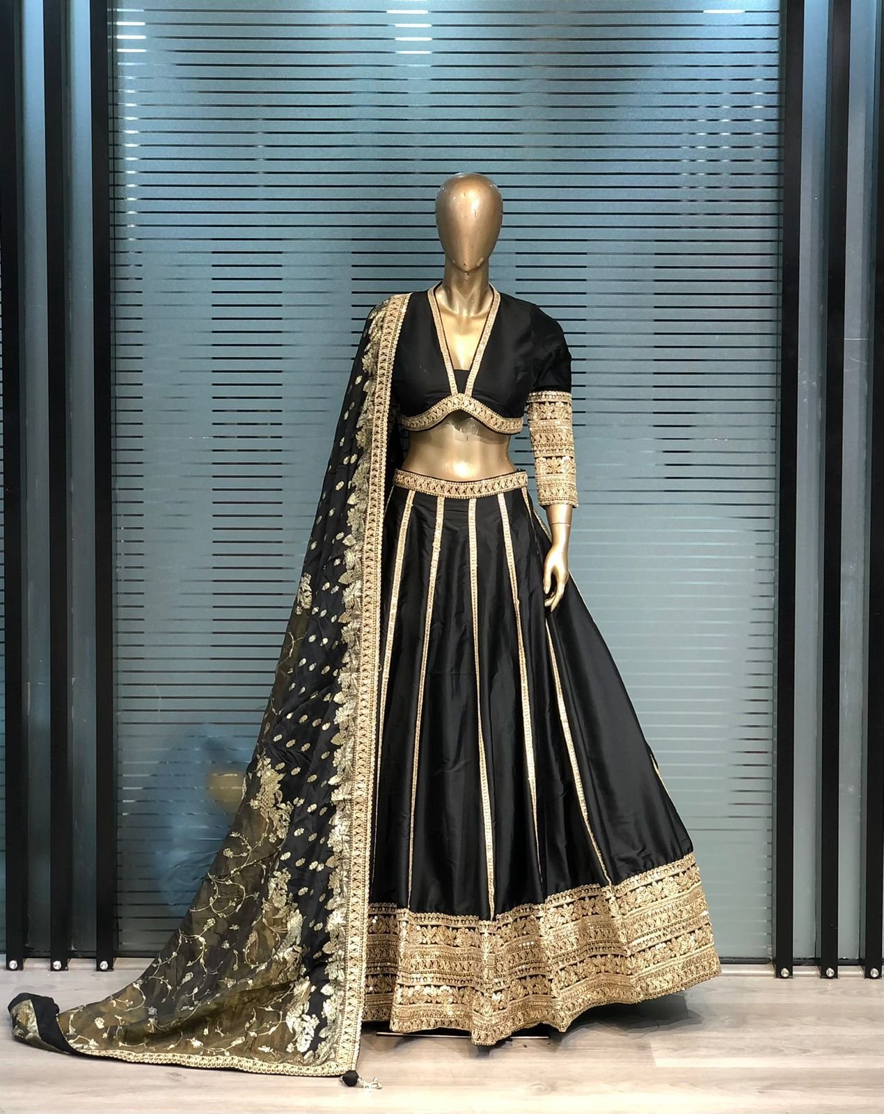 Black Designer Lehenga Choli with Gold Zari Border